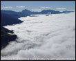 Val Brembana immersa nella nebbia